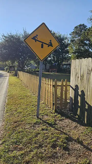 Slow down and pay attention when driving by Mallard Lake's playground.